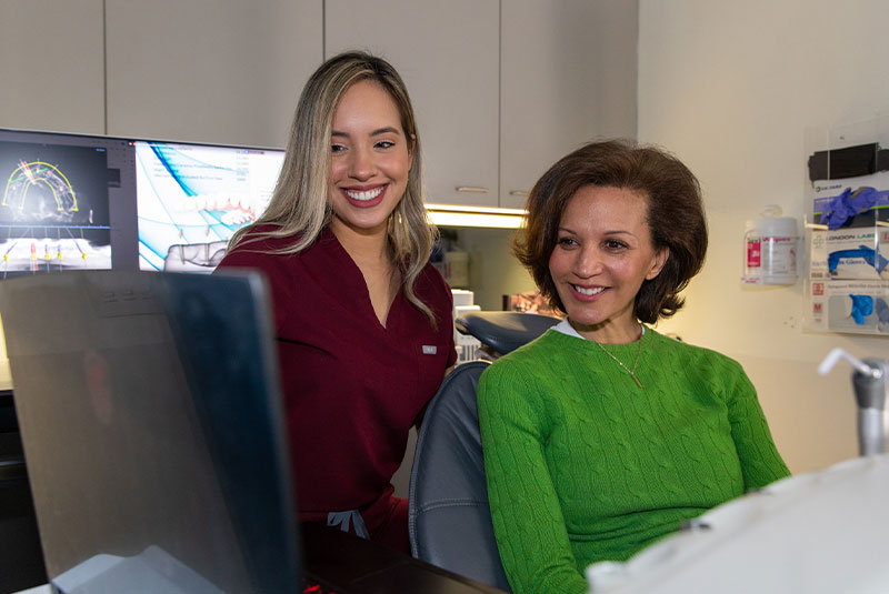 a dentist explaining a procedure to a patient